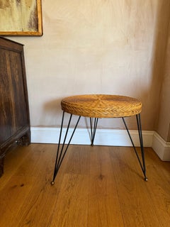 French 1950’s black metal and wicker side table style of Raoul Guys