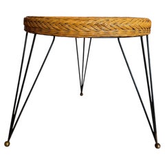 French 1950’s black metal and wicker side table style of Raoul Guys