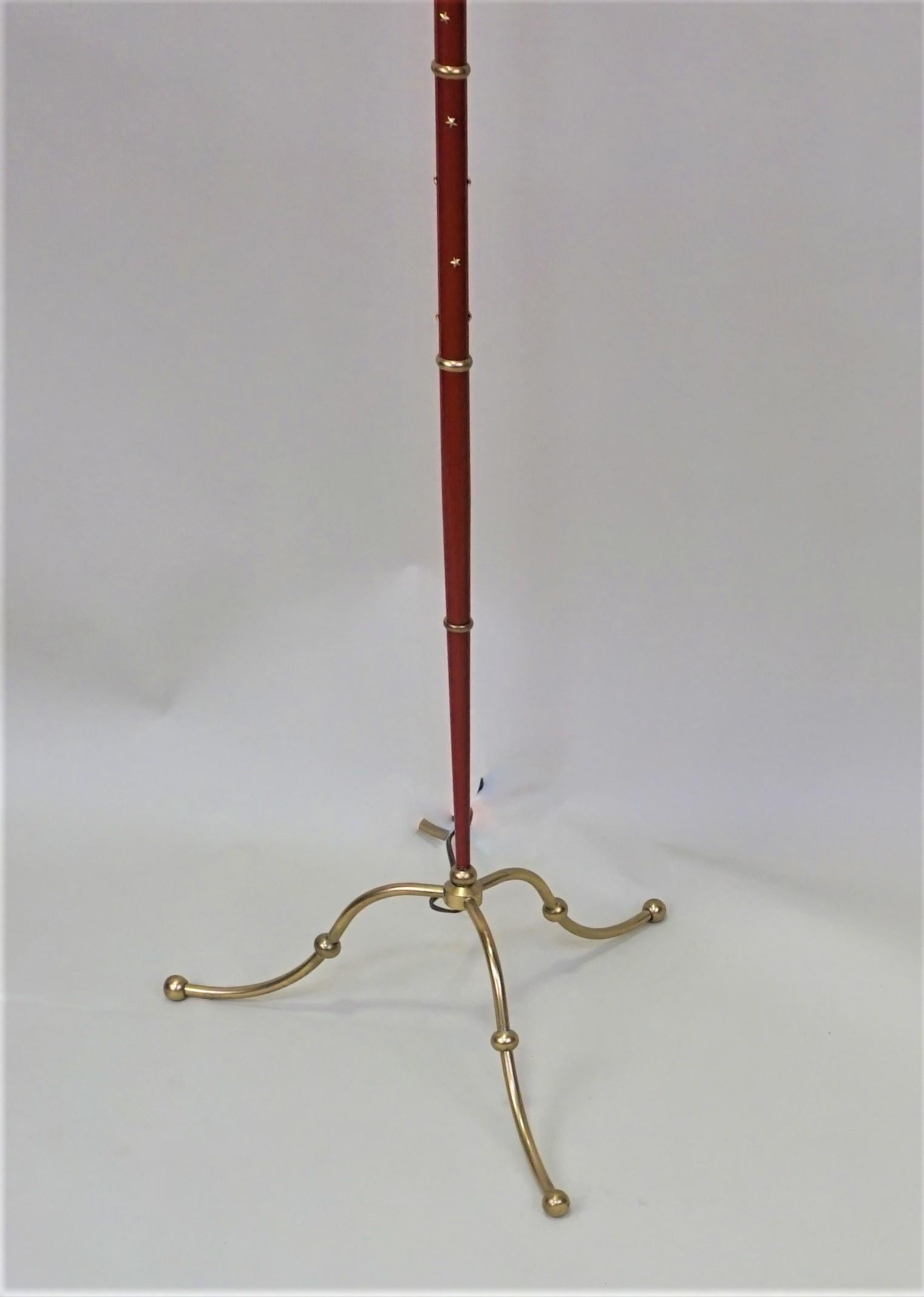 Rare bronze floor lamp with red lacquer column and bronze star.
Customized lampshade, double socket 100 watts max each.