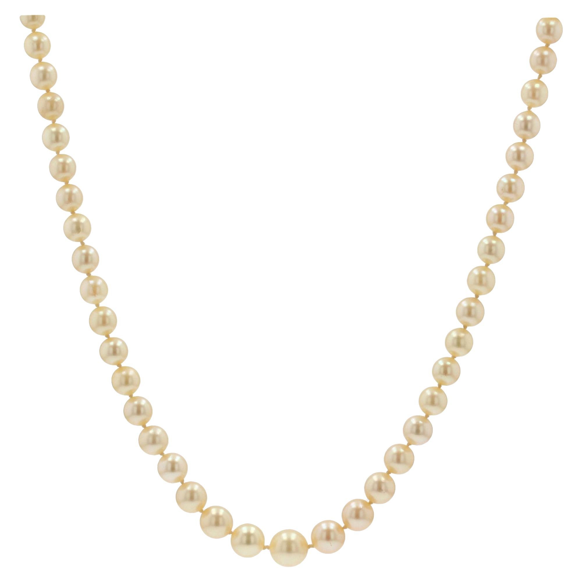 French 1950s Cultured Golden Falling Pearl Necklace For Sale