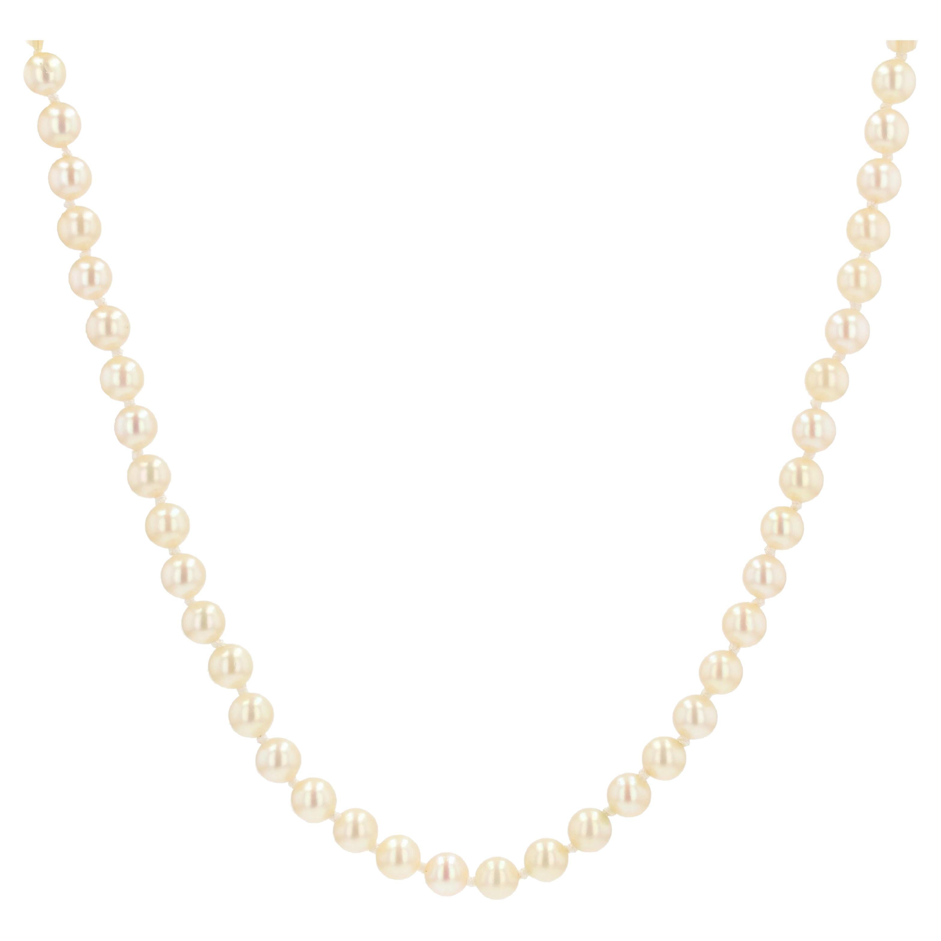 Orecchini con perla 7 mm su montatura lucida in oro giallo - Sari Gold