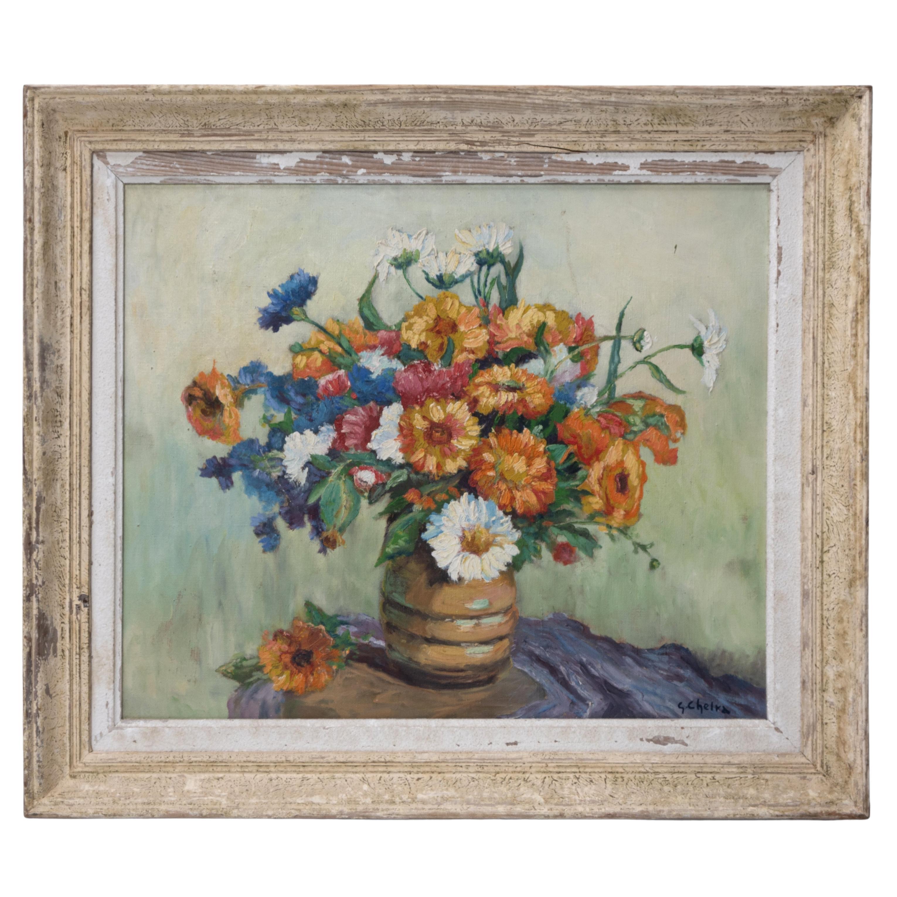 Nature morte de fleurs en huile sur toile encadrée des années 1950, signée