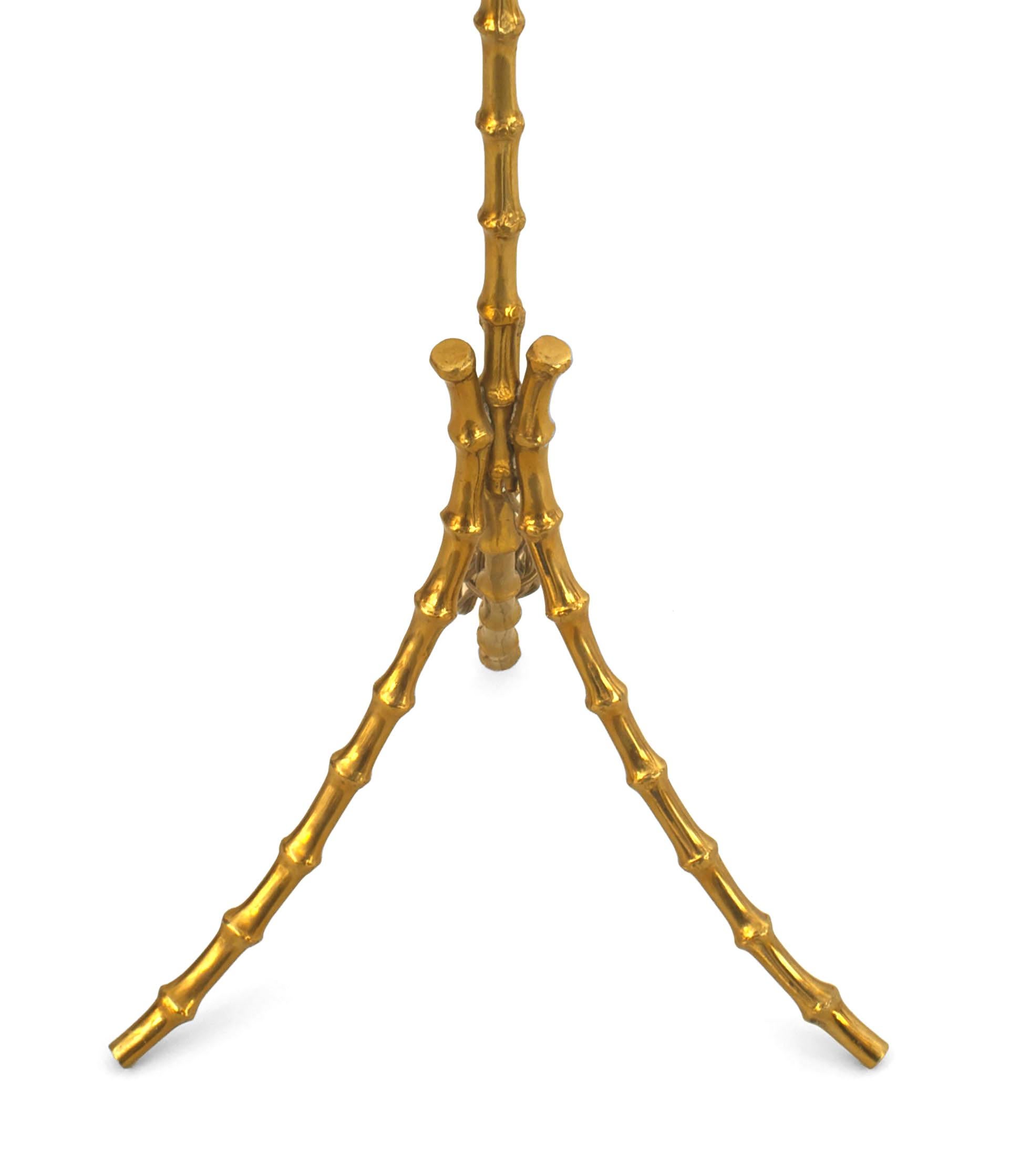 French 1950s gilt bronze faux bamboo design floor lamp resting on 3 feet (in the style of BAGUES).
