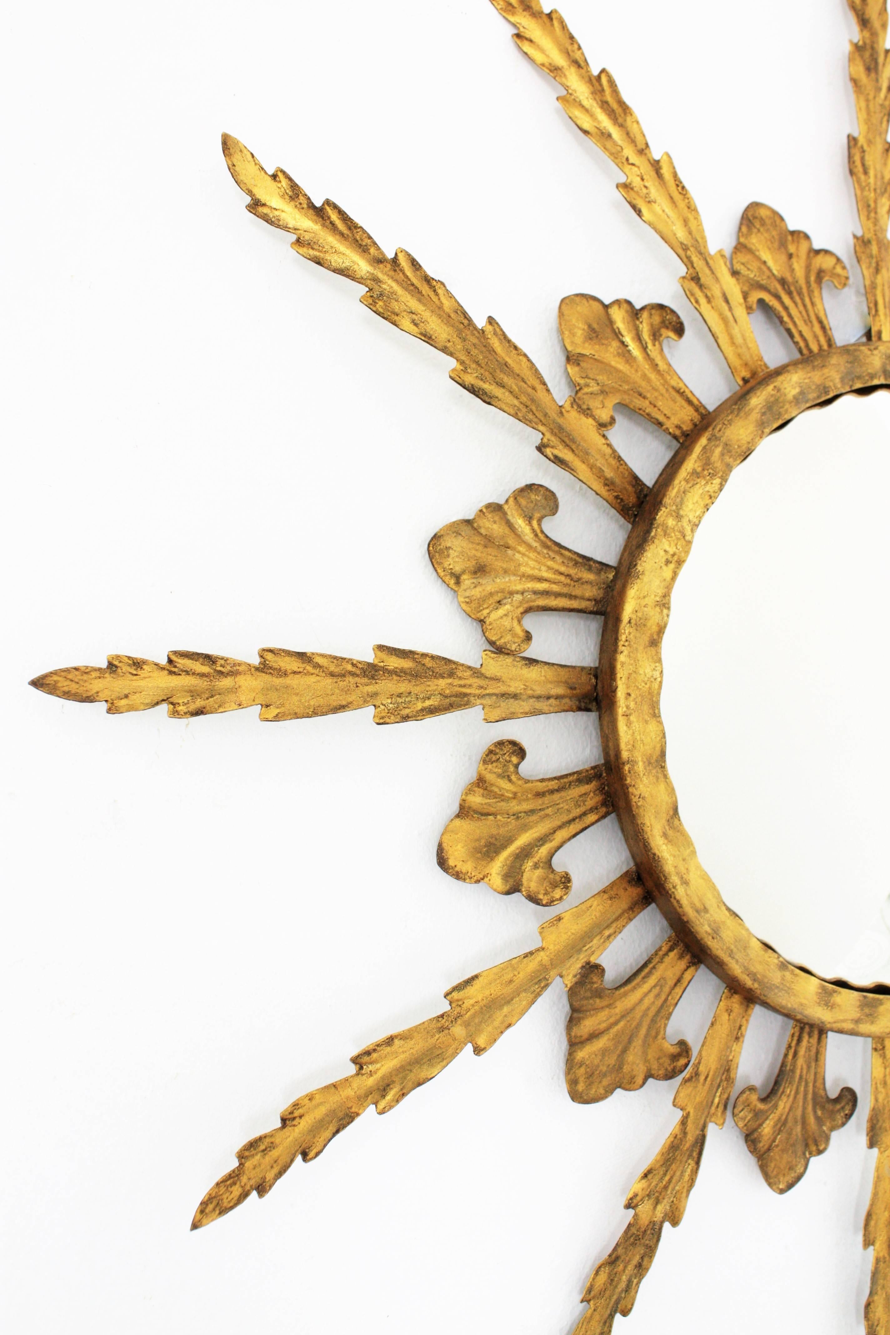 Hand-Crafted French Sunburst Convex Mirror in Gilt Iron, 1950s For Sale