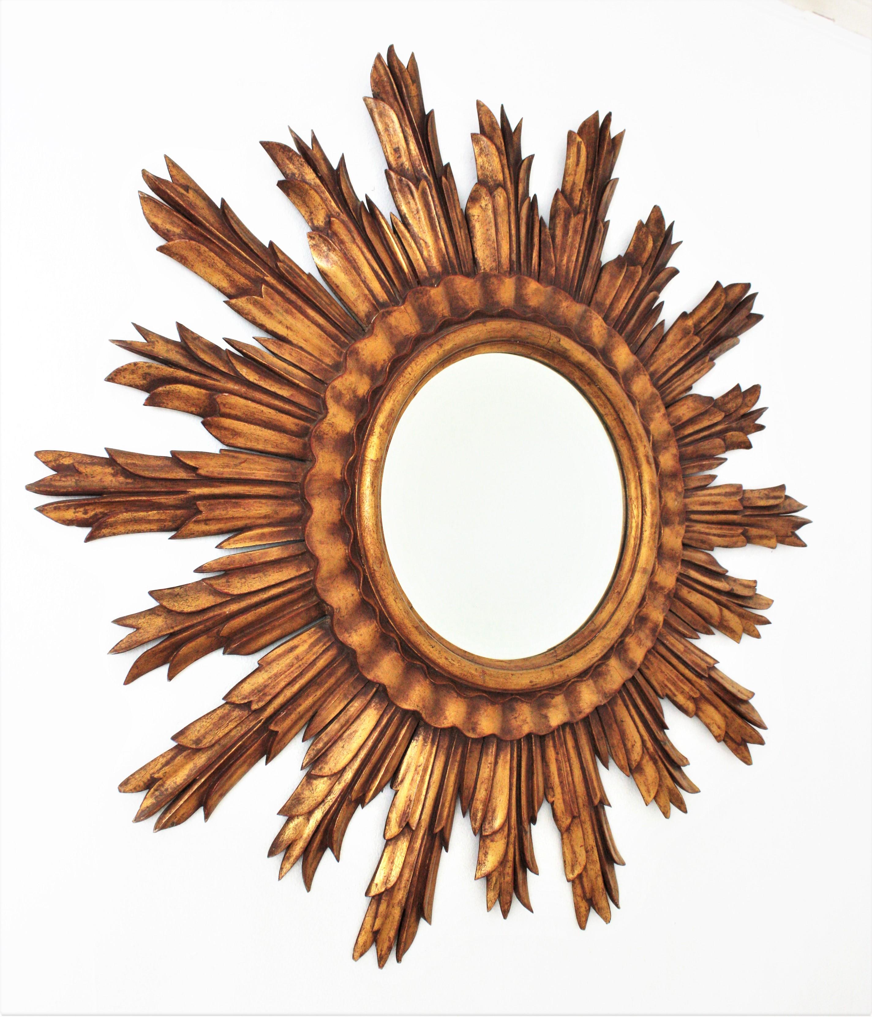 French Large Gilt XXL Sunburst Mirror in Carved Wood, France, 1950s For Sale