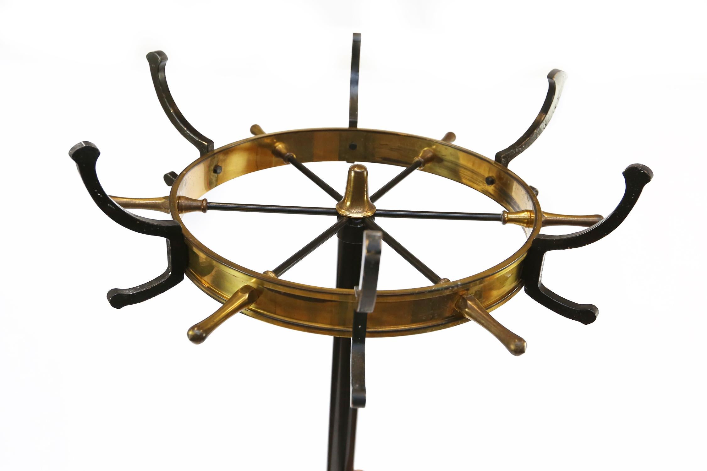 Jacques Adnet gilt bronze an black lacquered iron coat stand in great condition and patina.