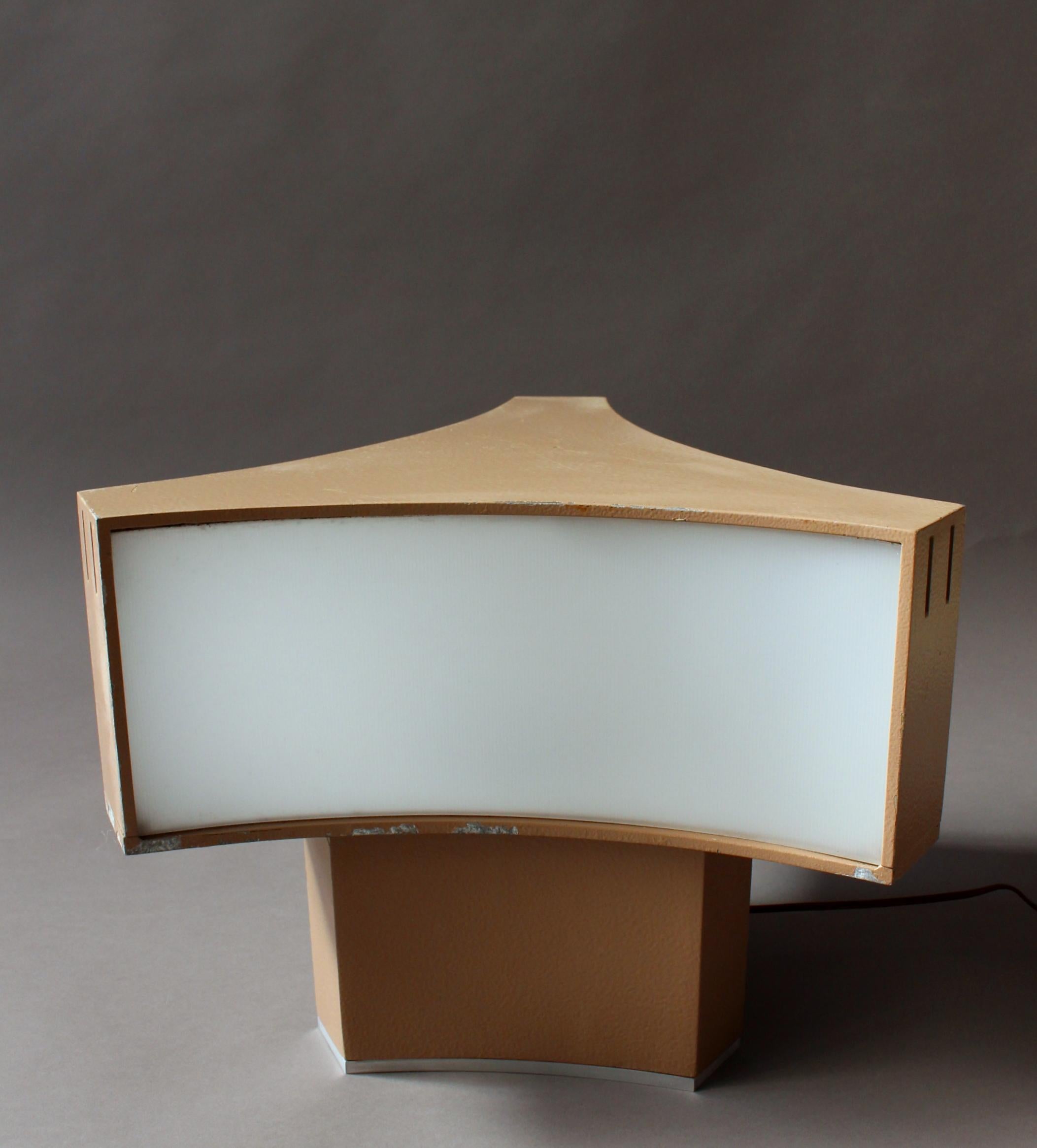 Rare French mid-century light brown lacquered metal table lamp with curved Plexiglas diffusers by Jean Perzel.
Signed.