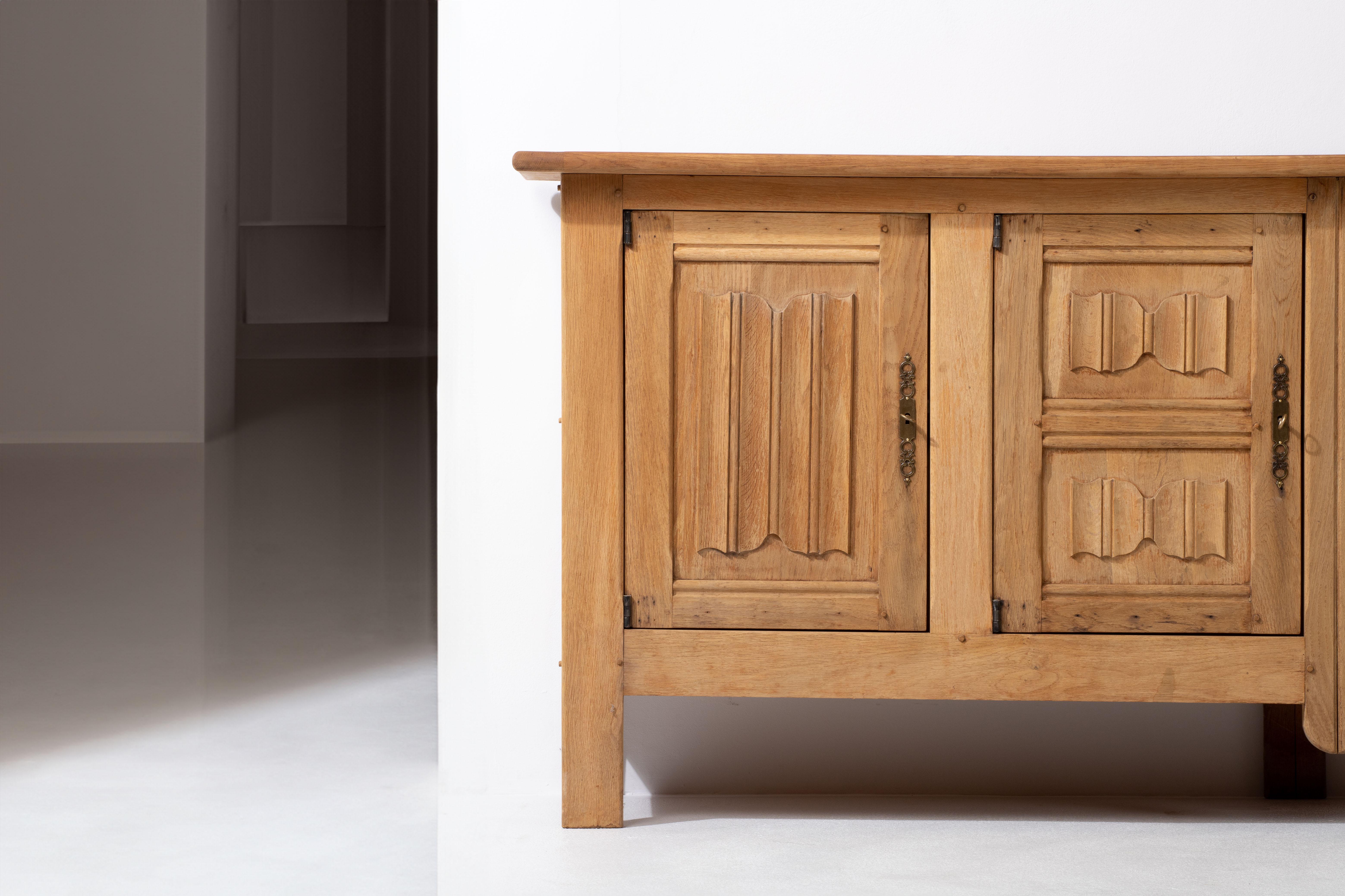 French 1950s Natural Oak Sideboard with Intricate Carved Panels For Sale 5