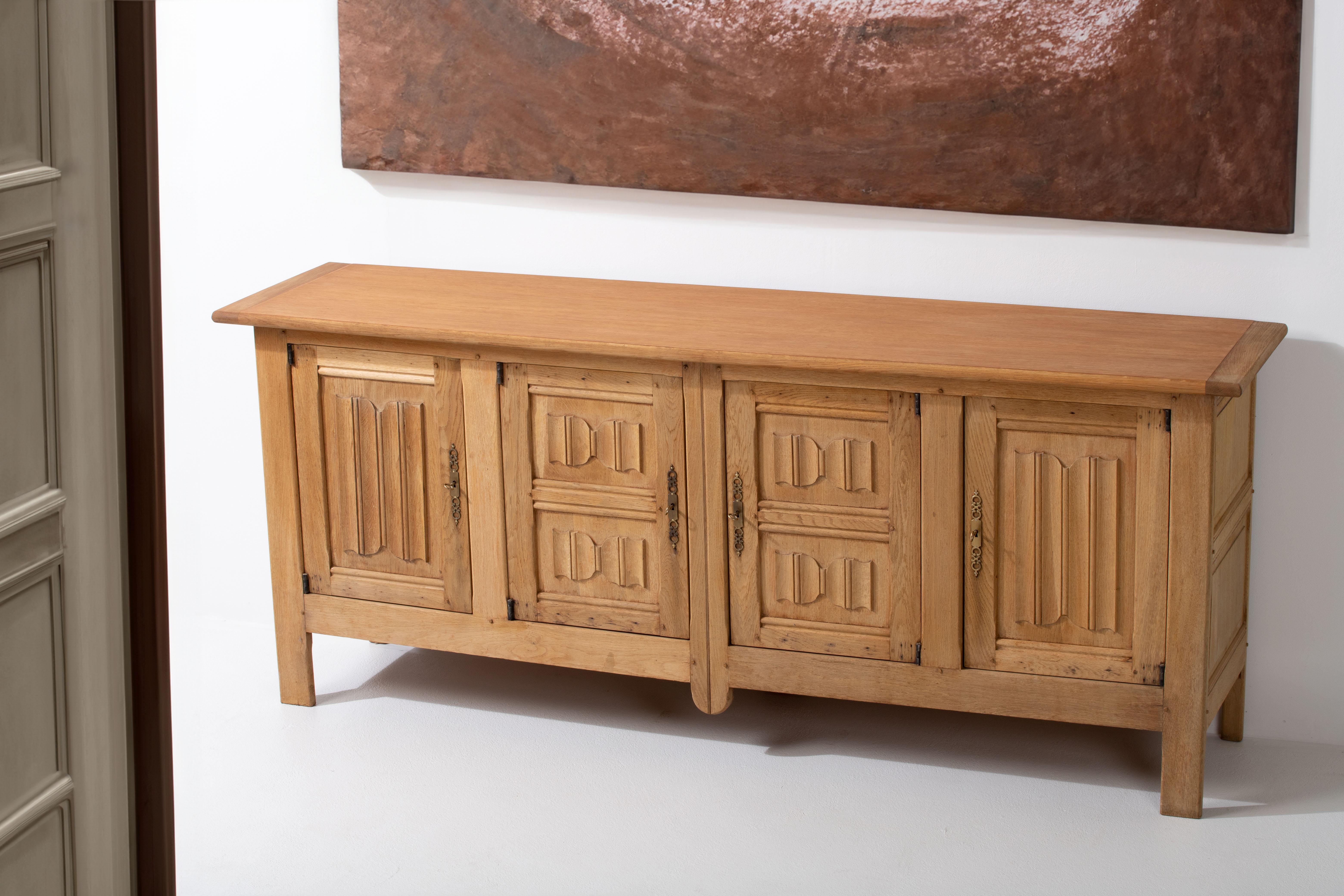 French 1950s Natural Oak Sideboard with Intricate Carved Panels For Sale 8