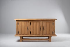 French 1950s Natural Oak Sideboard with Intricate Carved Panels