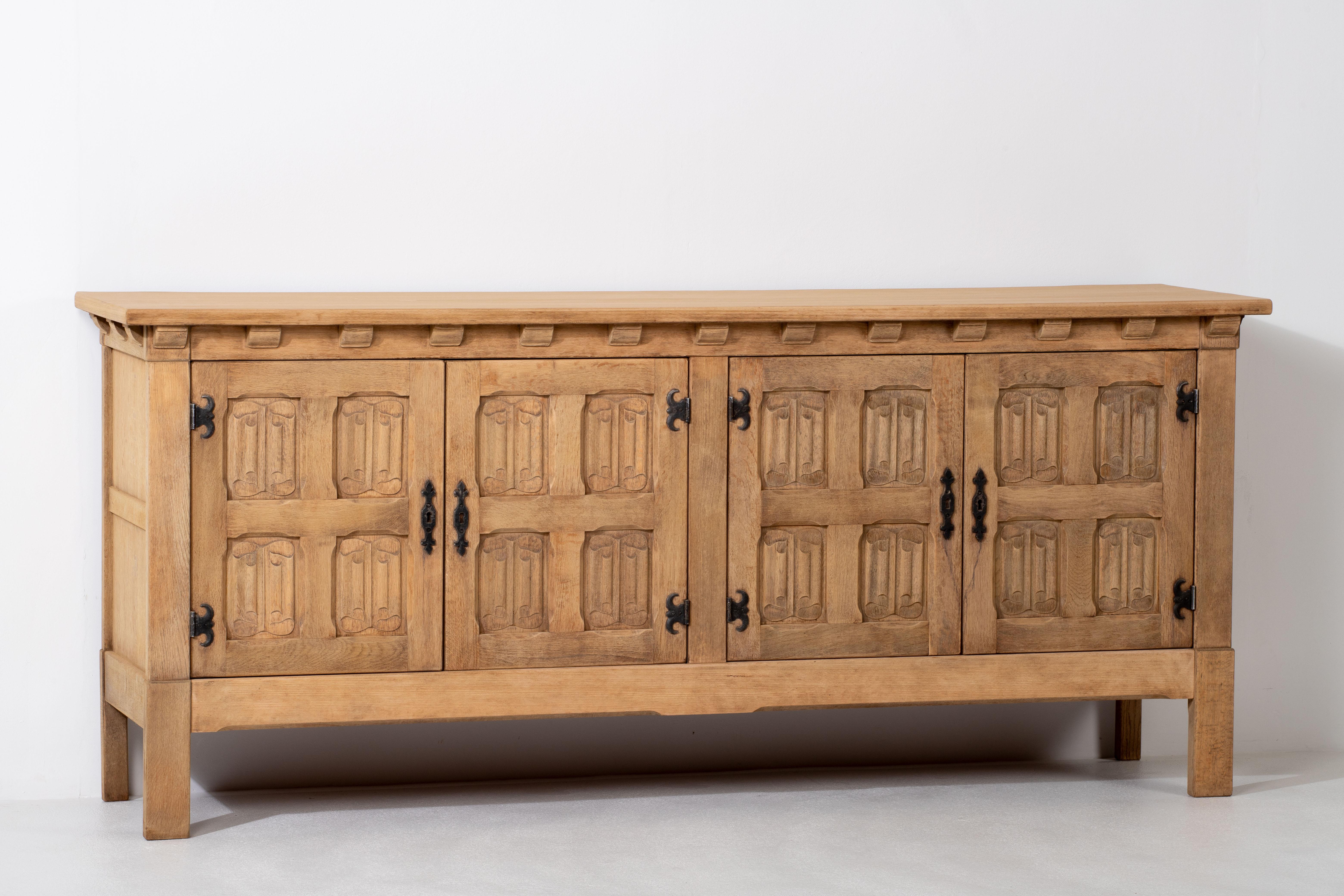 Mid-Century Modern French 1950s Natural Oak Sideboard with Intricate Carved Panels For Sale