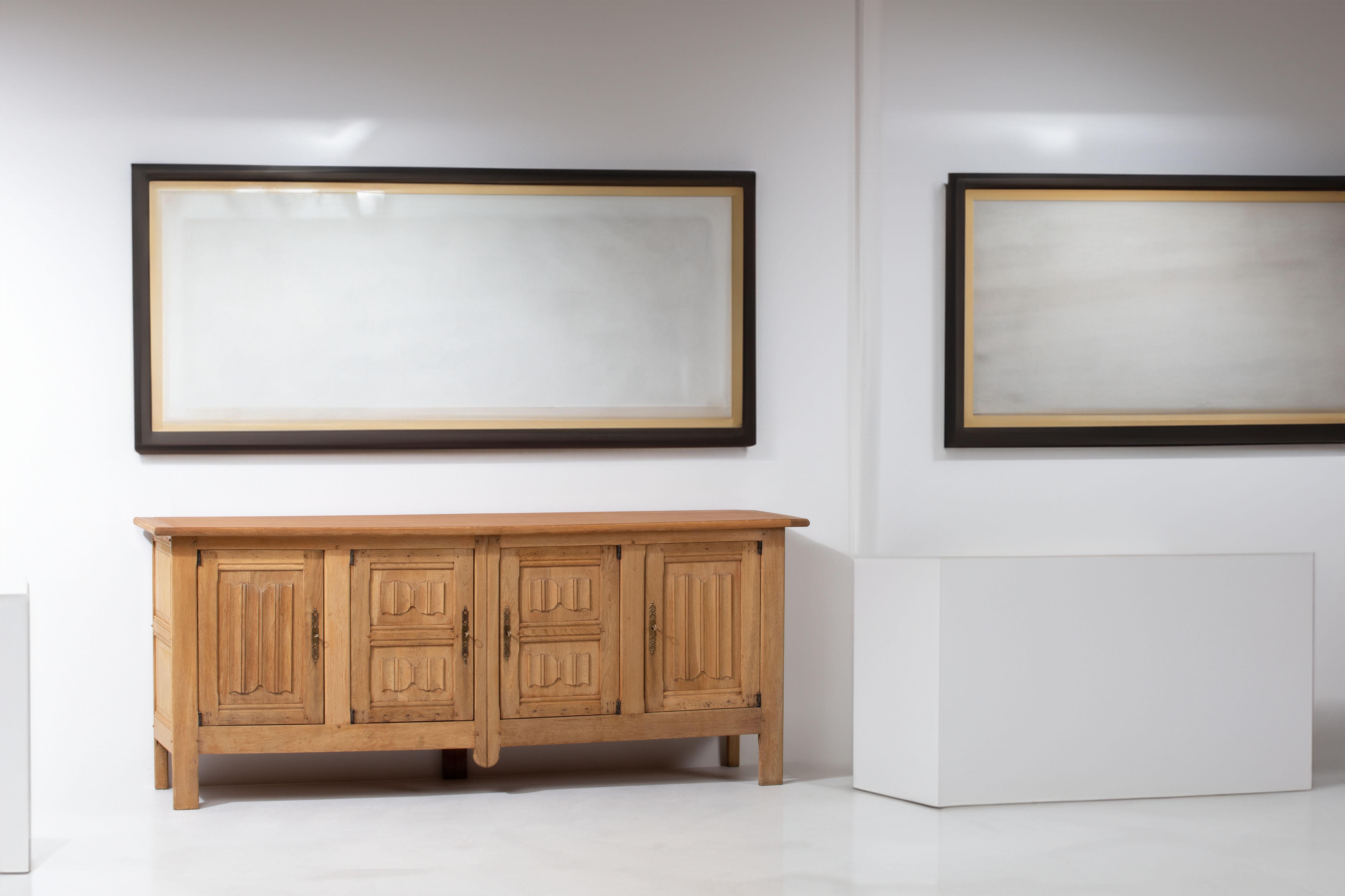 Mid-Century Modern French 1950s Natural Oak Sideboard with Intricate Carved Panels For Sale