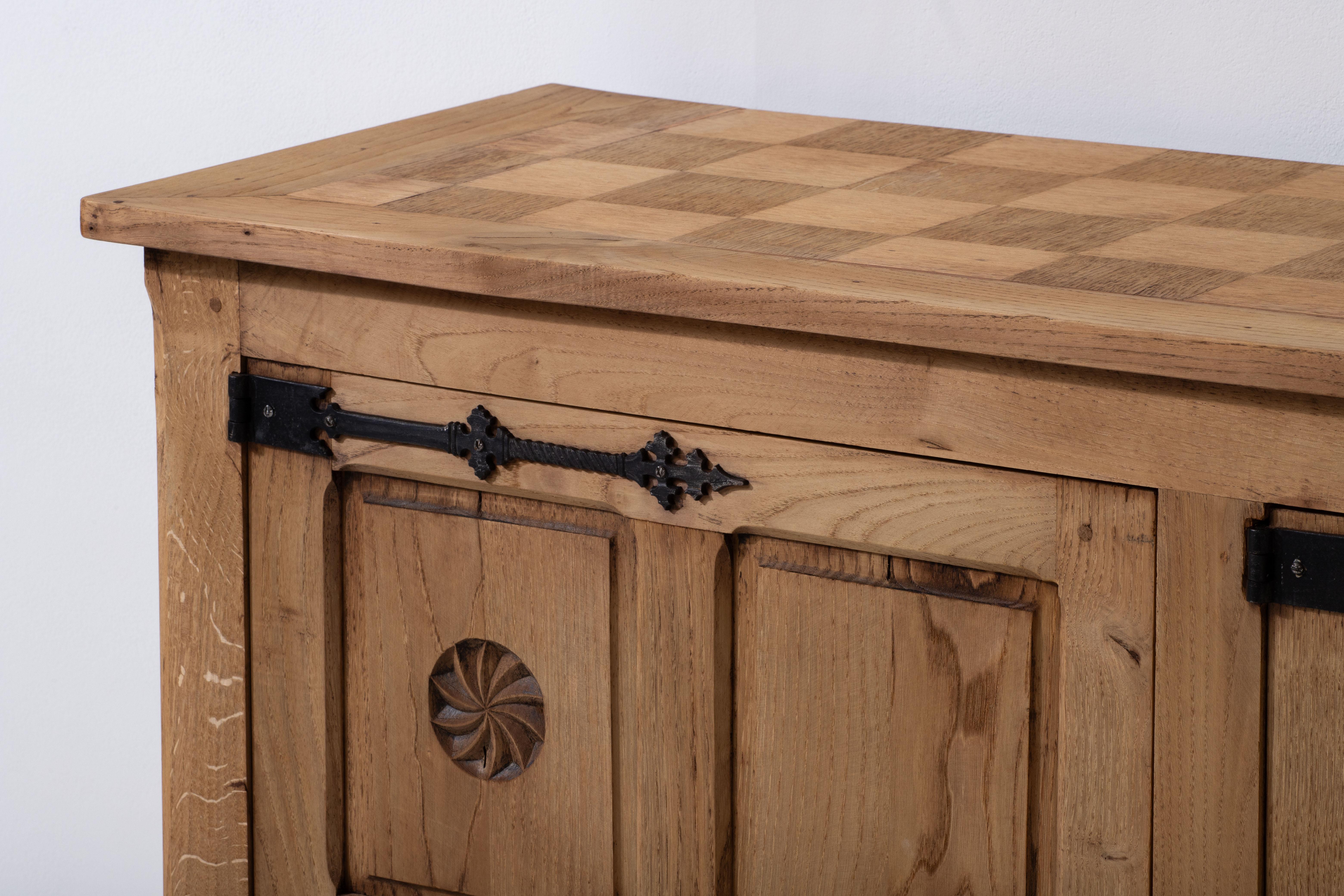 20th Century French 1950s Natural Oak Sideboard with Intricate Carved Panels For Sale