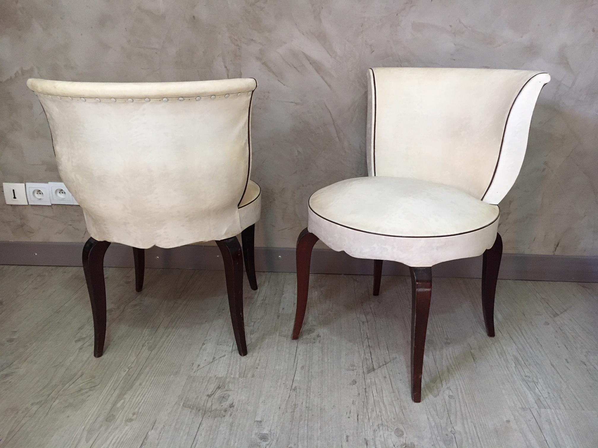 Very nice pair of French 1950s skai armless chairs.
 