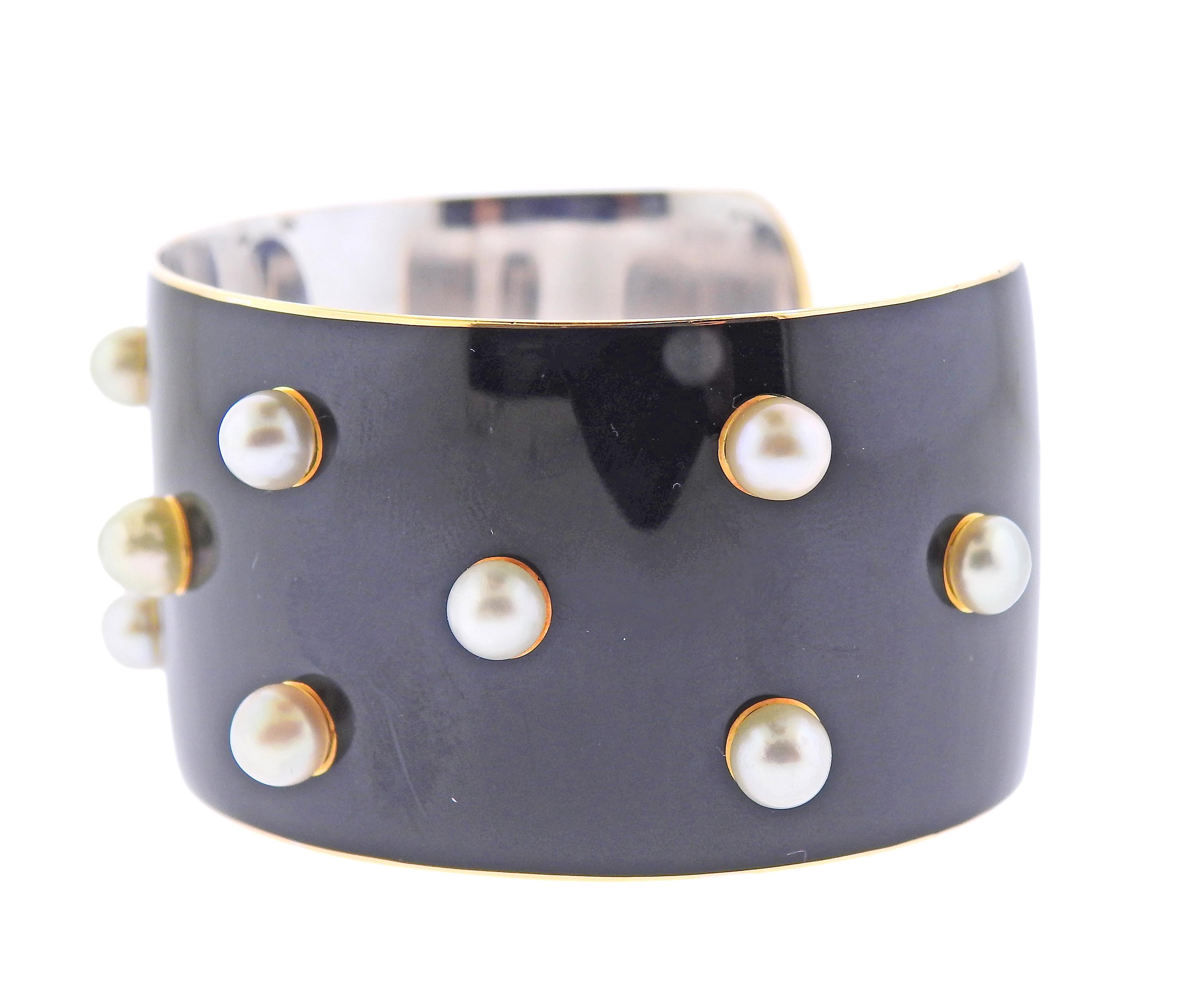 Mid century French made cuff bracelet in 18k white gold, decorated with black lacquer enamel and 5mm pearls. Bracelet will comfortably fit an average wrist 6.75