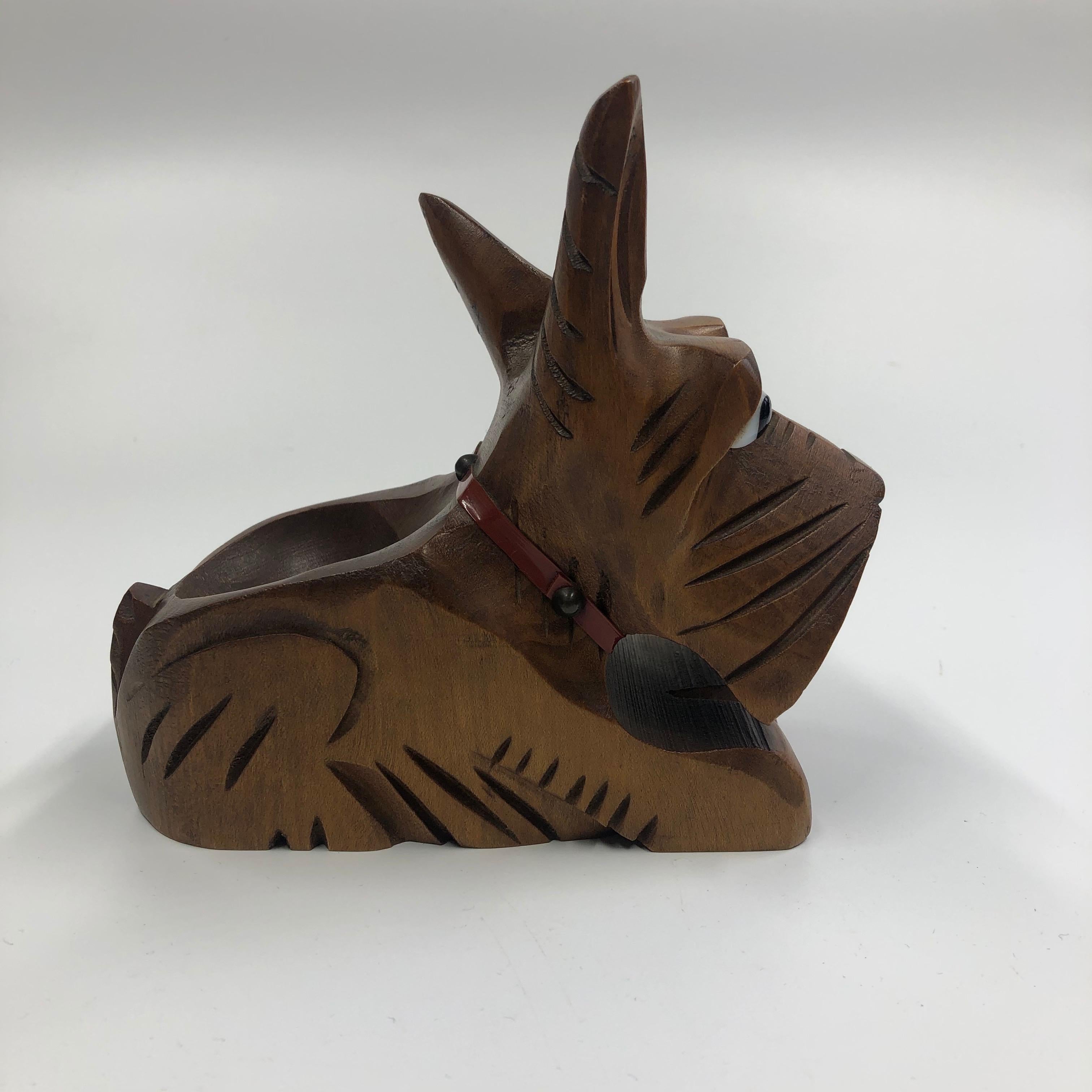Midcentury carved wooden Scottish terrier pipe holder, France, 1950s.
The pipe holder is in excellent condition.
Measurements:
Length 15 cm
Height 13
Depth 6.