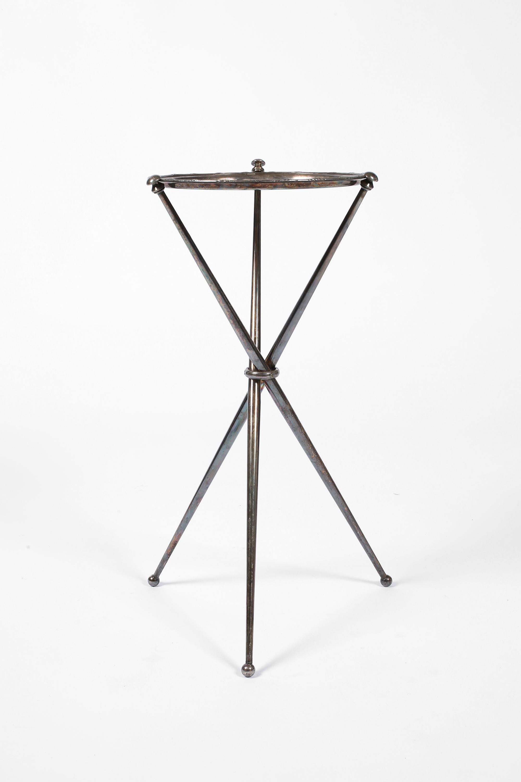 A beautifully tarnished silver-plated brass side/drinks table, with circular tray top and ring-bound tripod legs. French, c. 1950s.