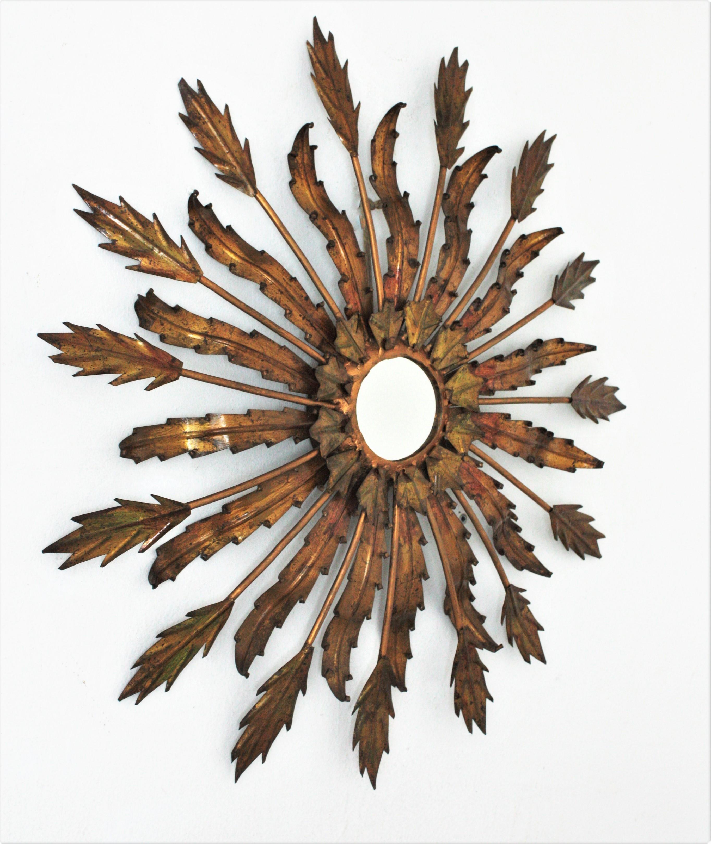 French 1950s Sunburst Mirror with Leaf Design in Bronze Gilt Iron In Good Condition In Barcelona, ES
