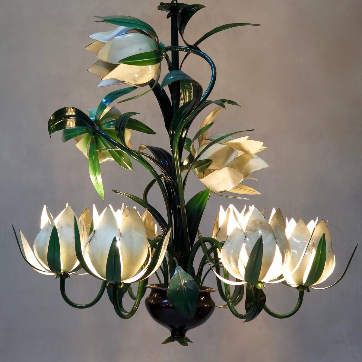 Charming midcentury painted tôle chandelier with large flowers and luxuriant-looking foliage. The six lower flowerheads light up; the three above are decorative.