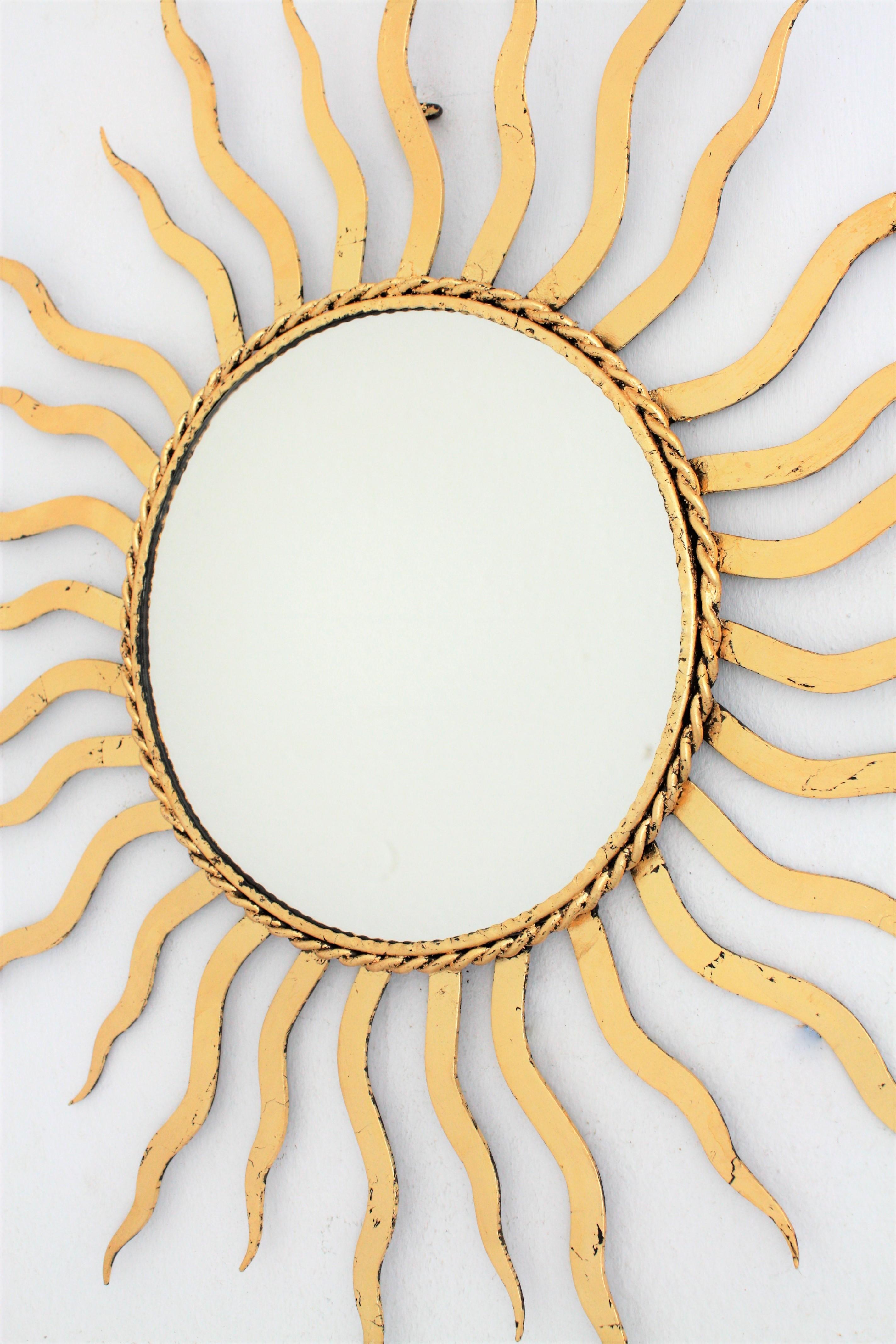 French 1950s Wrought Gilt Iron Sunburst Mirror in the Style of Gilbert Poillerat 3