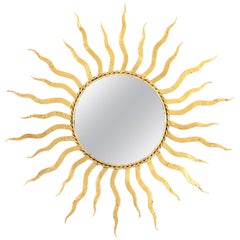 French 1950s Wrought Gilt Iron Sunburst Mirror in the Style of Gilbert Poillerat