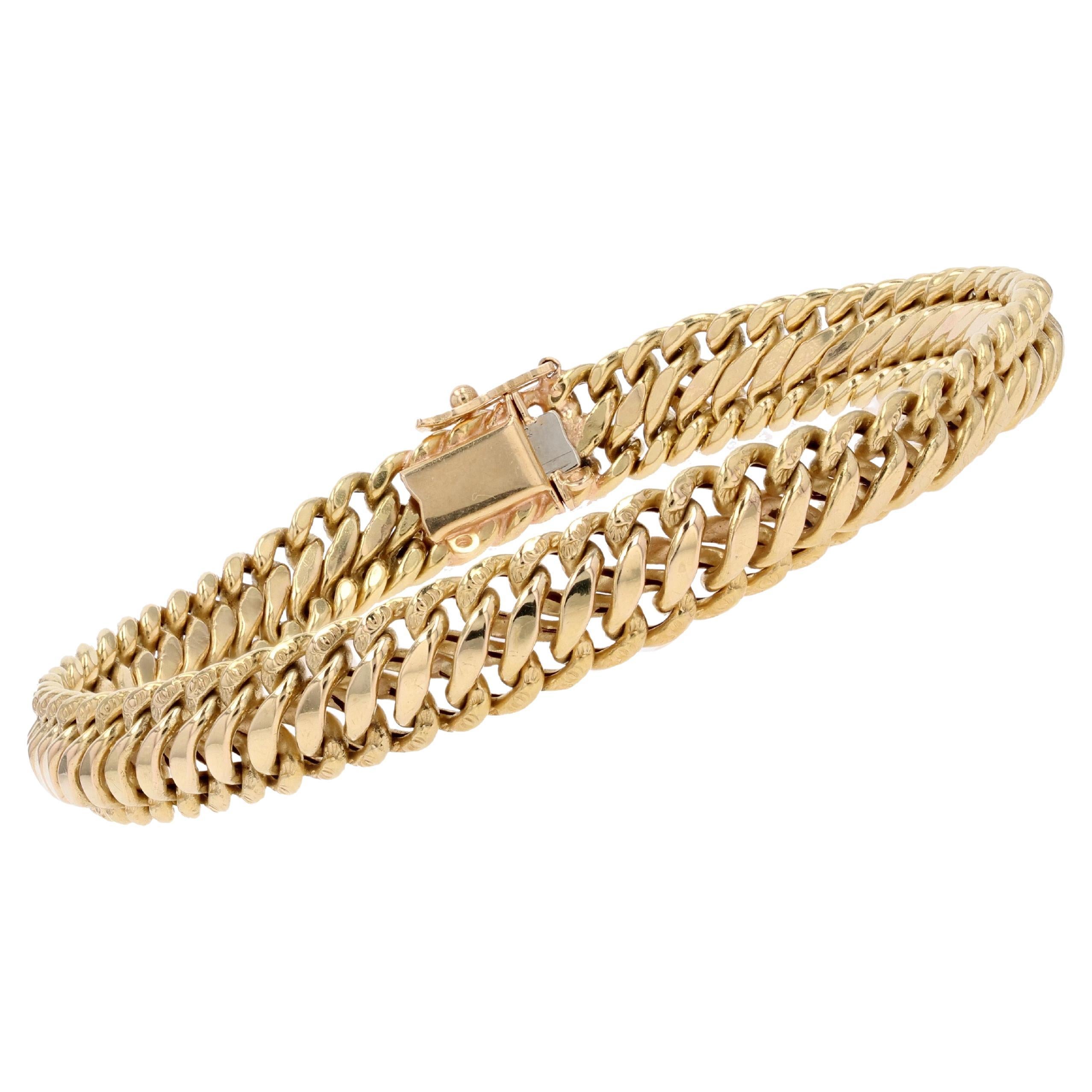 French 1960s 18 Karat Yellow Gold Chiseled Curb Retro Bracelet For Sale