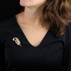 Broche rétro à plumes en or jaune 18 carats des années 1960