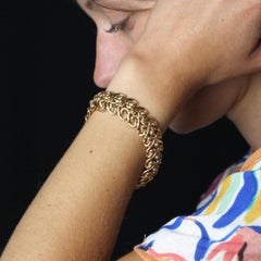 French 1960s 18 Karat Yellow Gold Flexible Arabesque Retro Bracelet