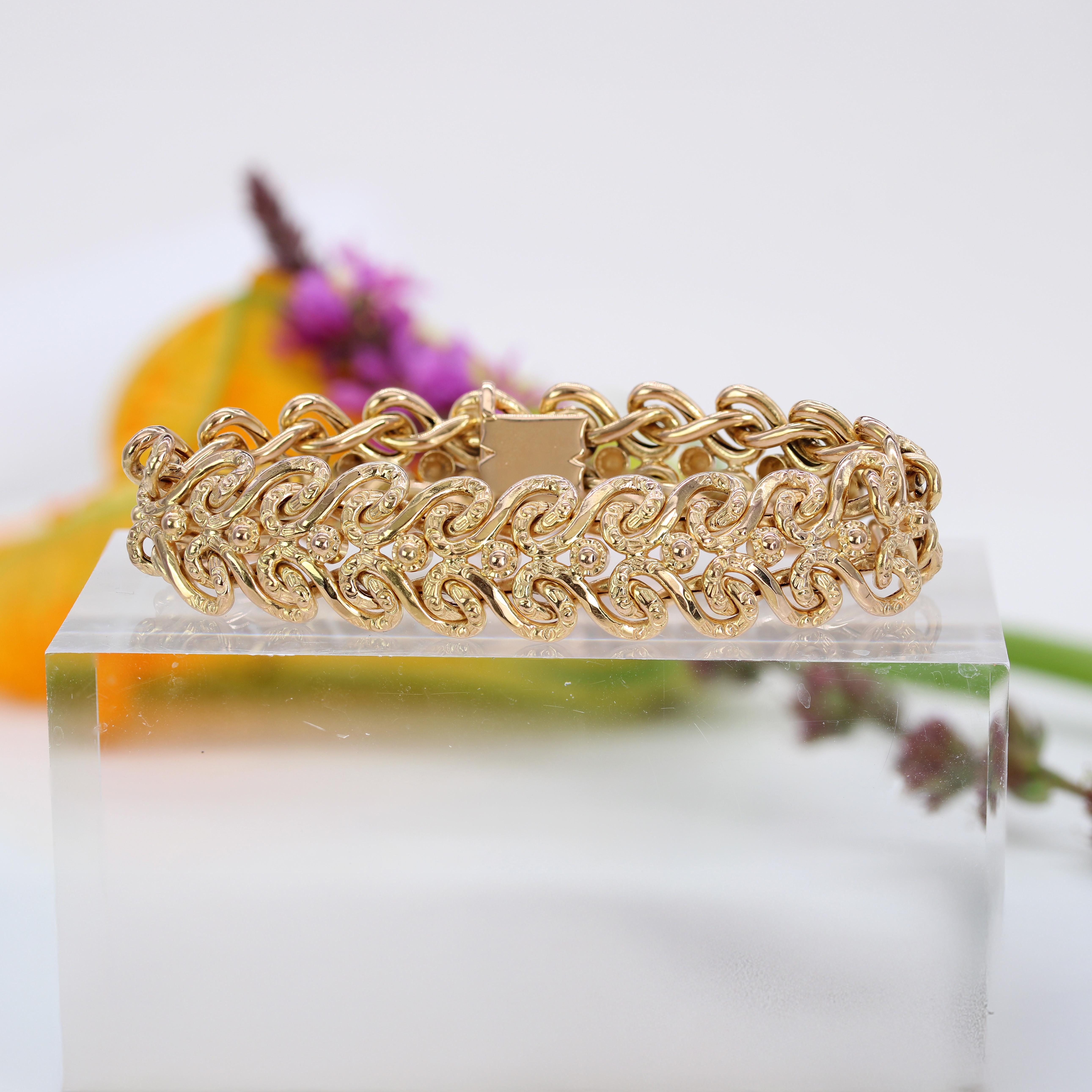Französisches 1960er Jahre 18 Karat Gelbgold Flexibles Arabesken-Retro-Armband im Zustand „Gut“ im Angebot in Poitiers, FR
