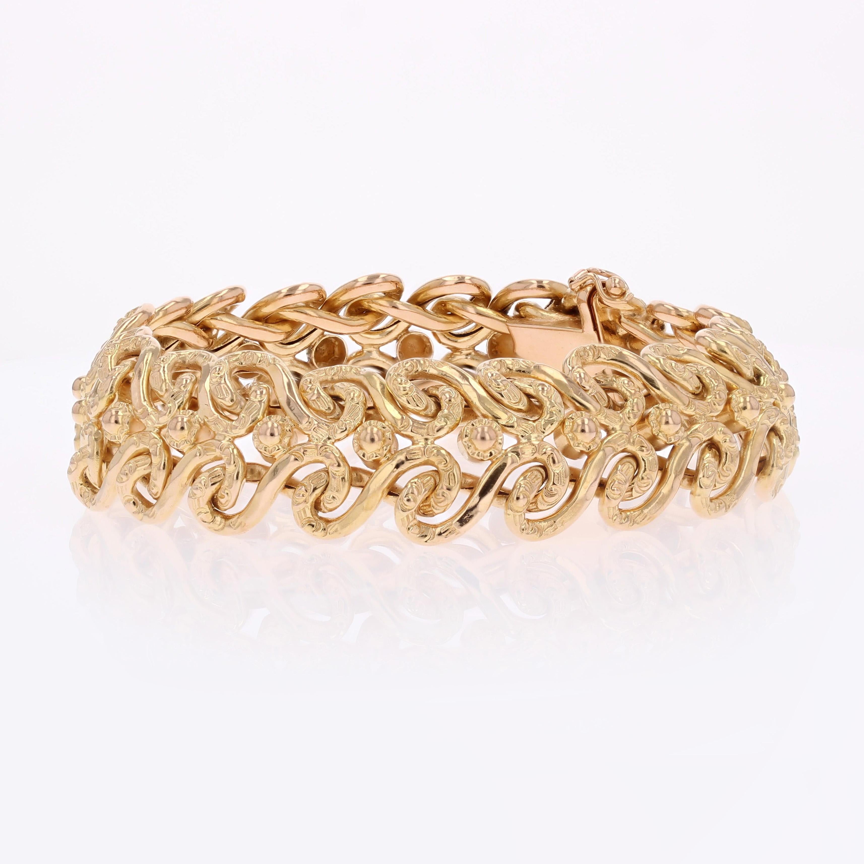 Französisches 1960er Jahre 18 Karat Gelbgold Flexibles Arabesken-Retro-Armband Damen im Angebot