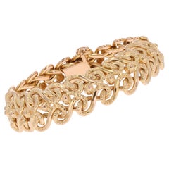 French 1960s 18 Karat Yellow Gold Flexible Arabesque Retro Bracelet
