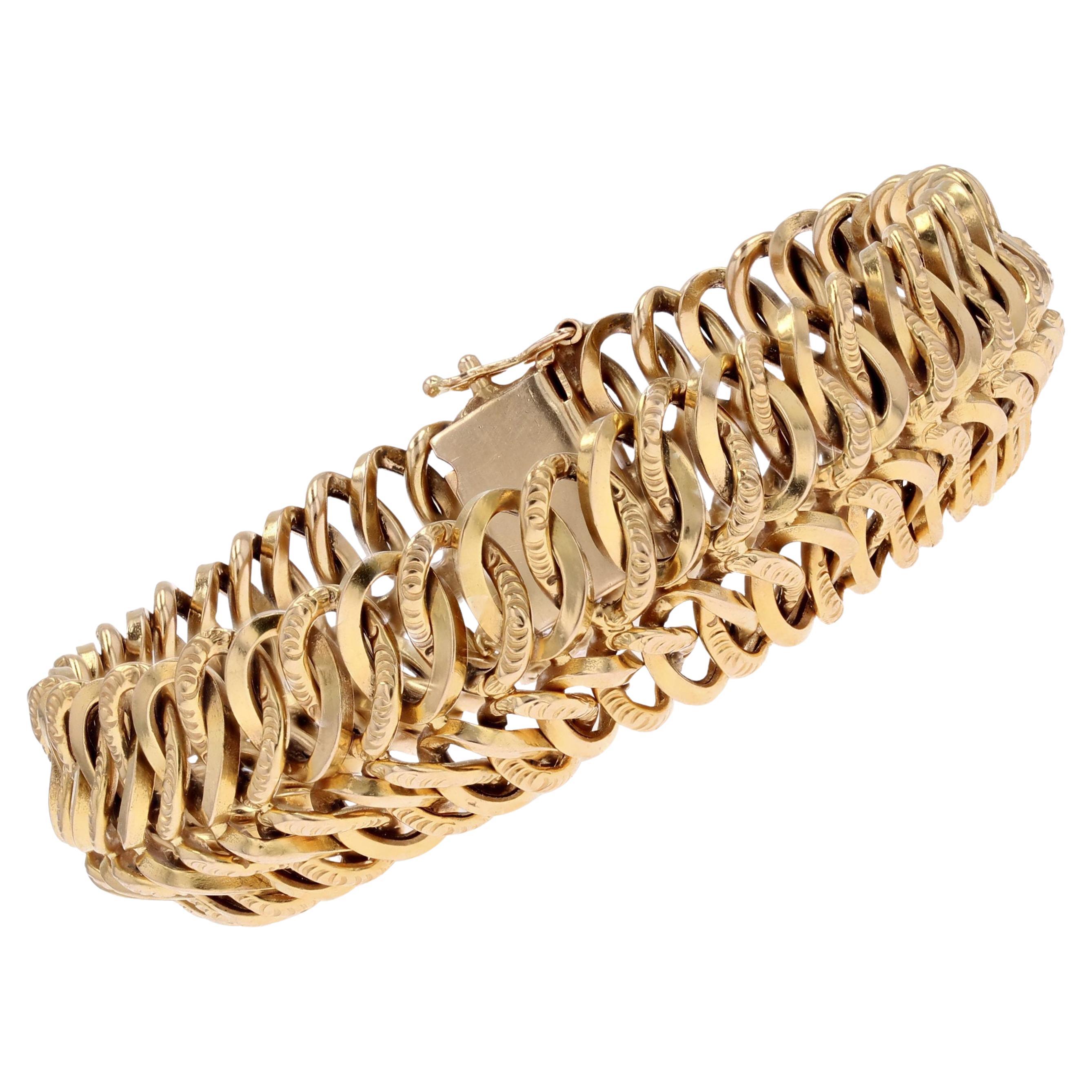 Bracelet rétro flexible en or jaune 18 carats des années 1960