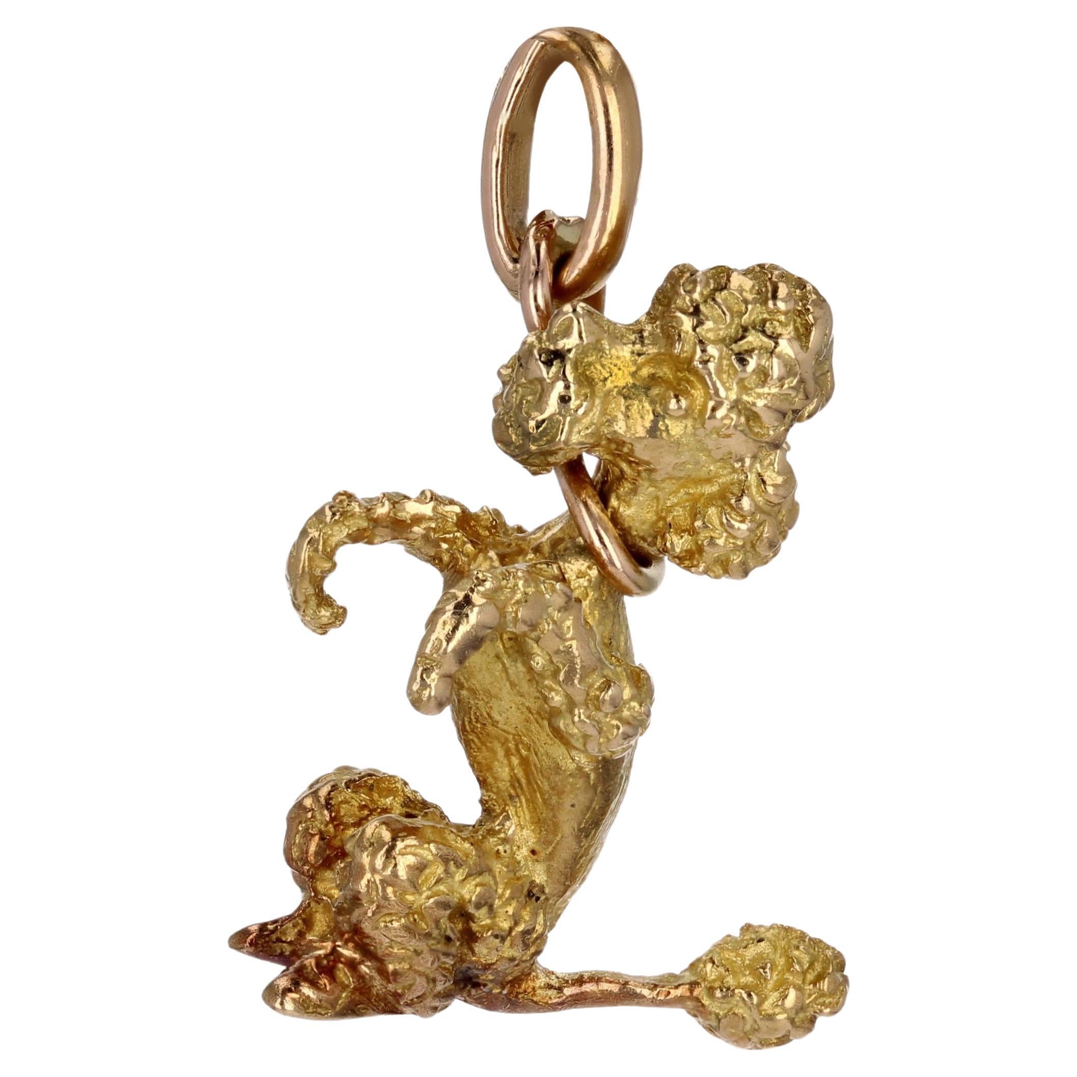 French 1960s 18 Karat Yellow Gold Sitting Poodle Charm Pendant For Sale