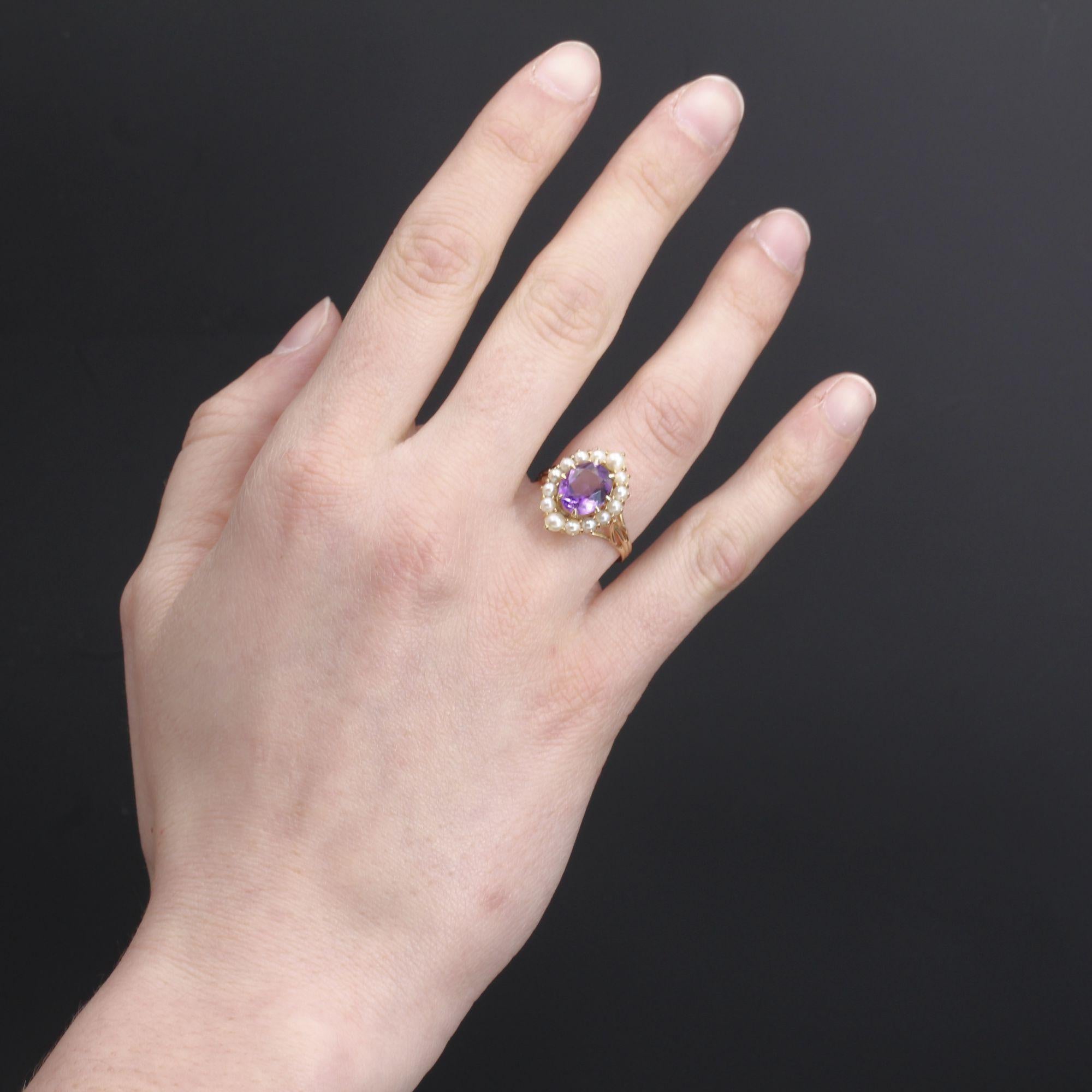 Ring in 18 karat yellow gold, eagle head hallmark.
A lovely antique ring, it is set in the center of an amethyst in a circle of half cultured pearls. The setting is made of gold wire.
Weight of the amethyst : about 1.70 carat.
Diameter of the pearls