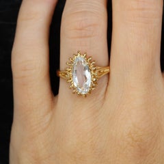 Anillo francés de los años 60 con aguamarina y cordón de oro amarillo de 18 quilates