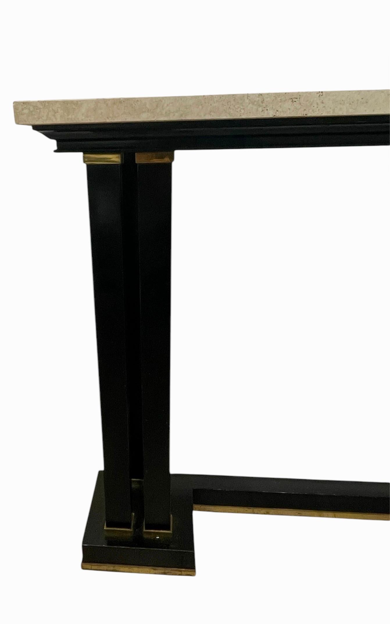 Lacquered French 1960s Black lacquer , brass and travertine console table by Maison Jansen For Sale