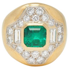 Anello Bombé francese degli anni '60 con smeraldo colombiano e diamante in oro giallo 18 carati