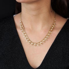 French 1960s Cultured Pearls 18 Karat Yellow Gold Flower Necklace