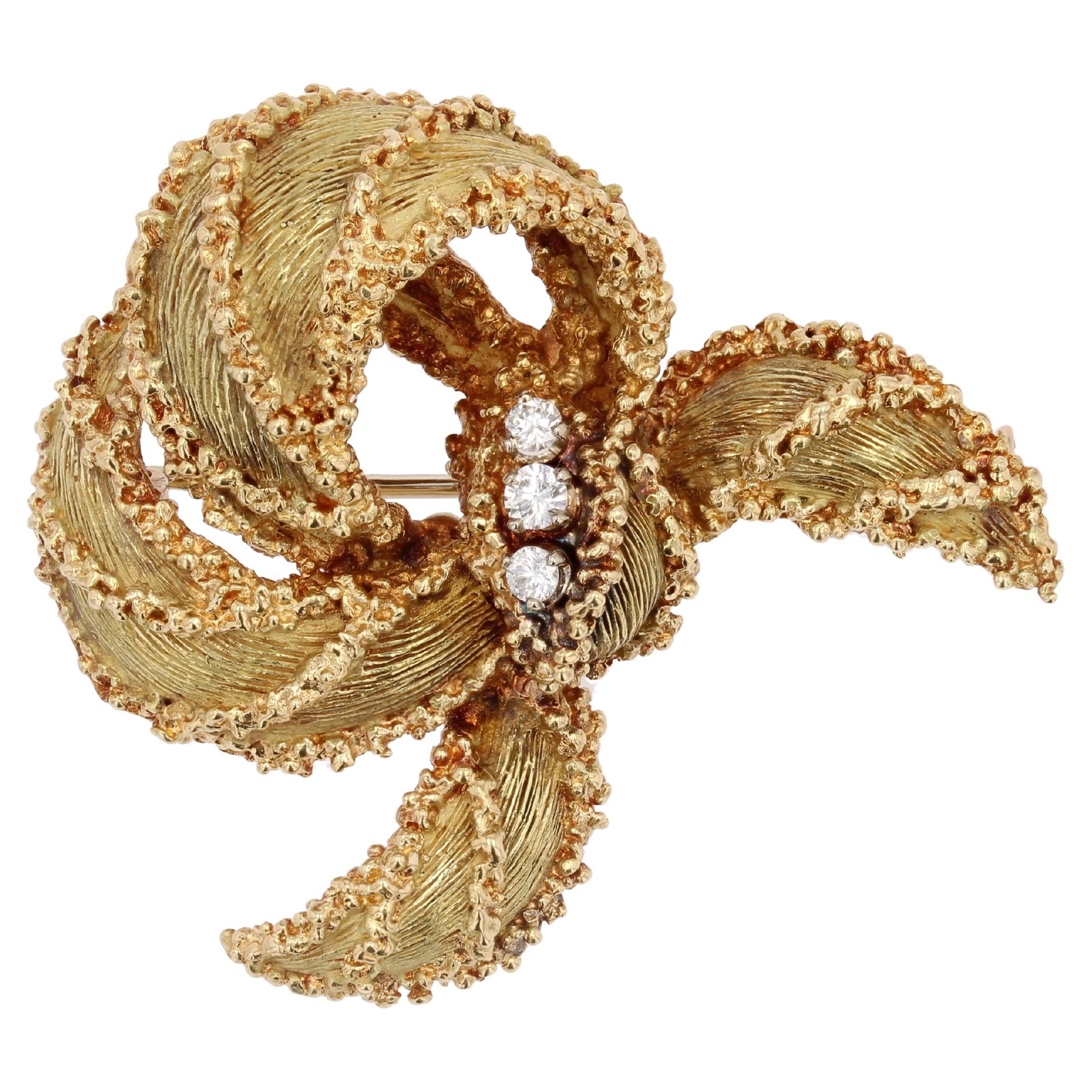 French 1960s Diamonds 18 Karat Yellow Gold Textured Ribbon Brooch