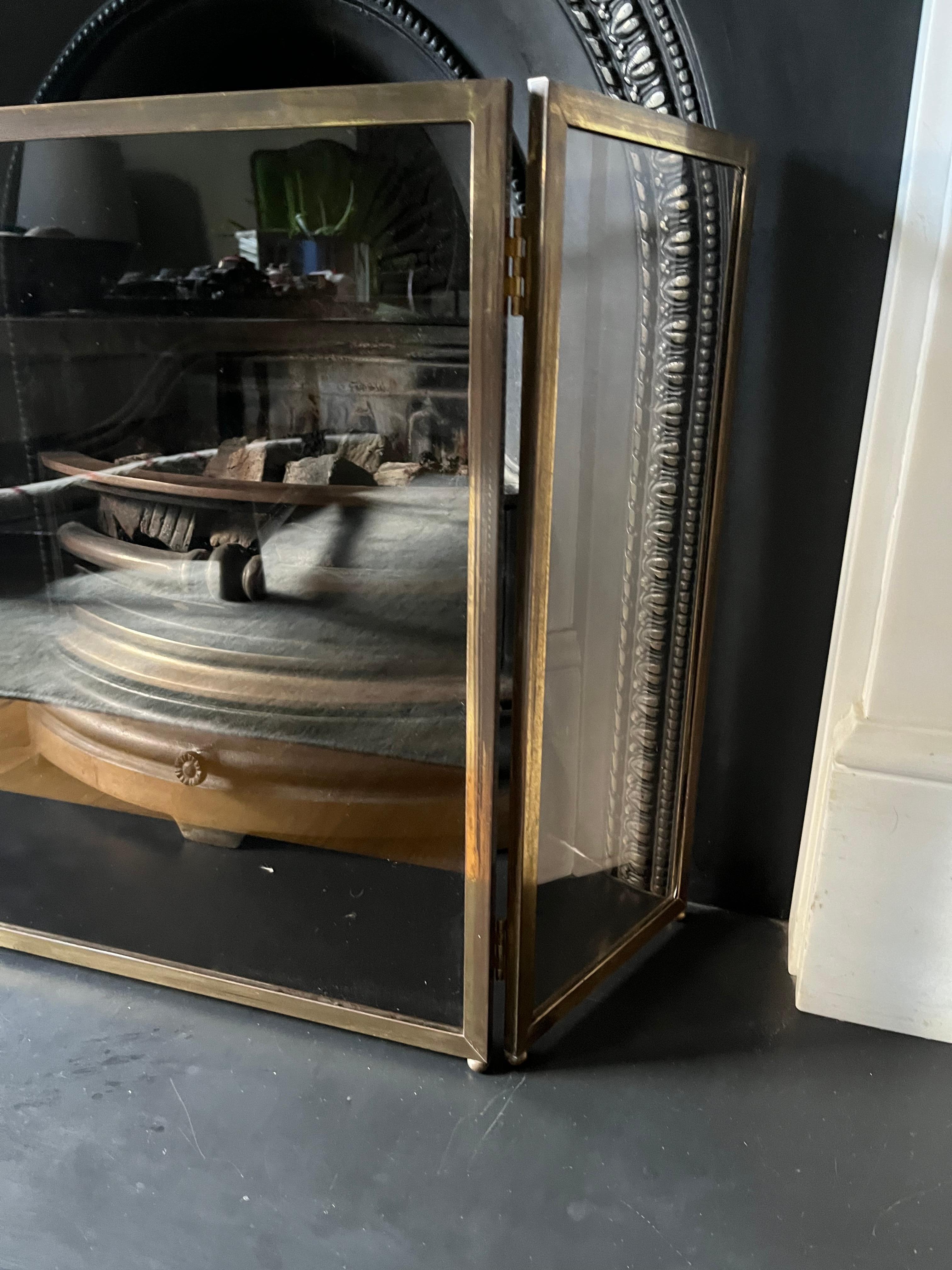 Metal French 1960’s gilt metal and glass folding screen