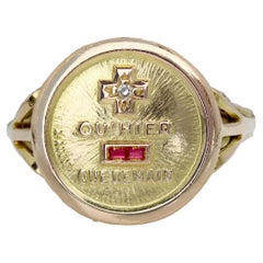 Anillo Augis francés de oro amarillo de 18 quilates con gemas rojas de los años 60