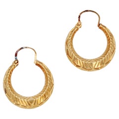 French 1960s Retro 18 Karat Yellow Gold Chiseled Hoop Earrings