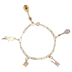 Bracelet Figaro en or jaune 18 carats avec charms rétro des années 1960