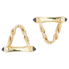 Gemelos franceses de oro amarillo de 18 quilates con diseño de estribo y zafiro de los años 60