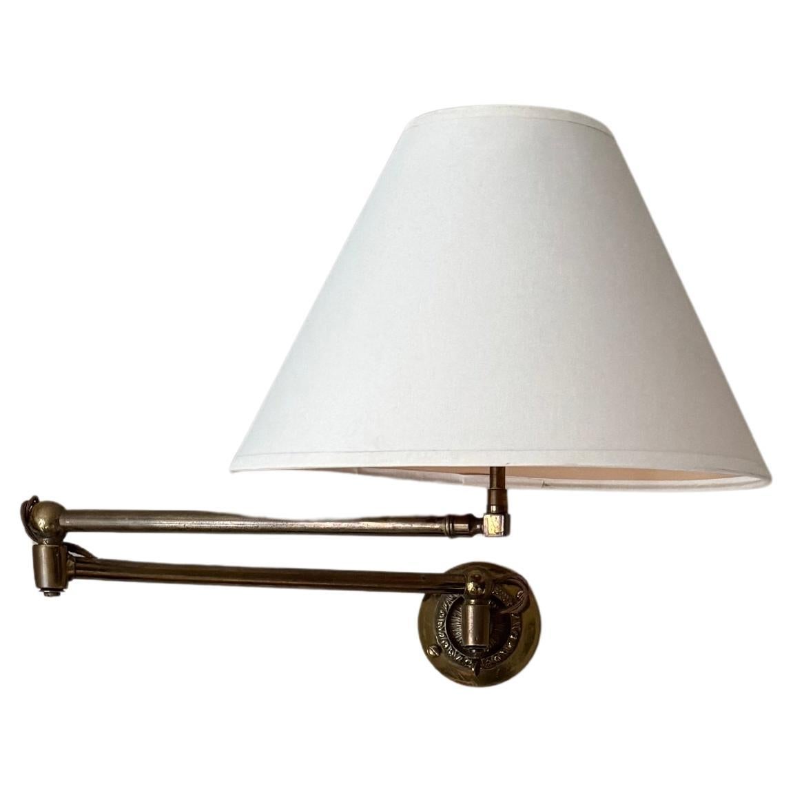 French 1960’s swing arm wall light For Sale