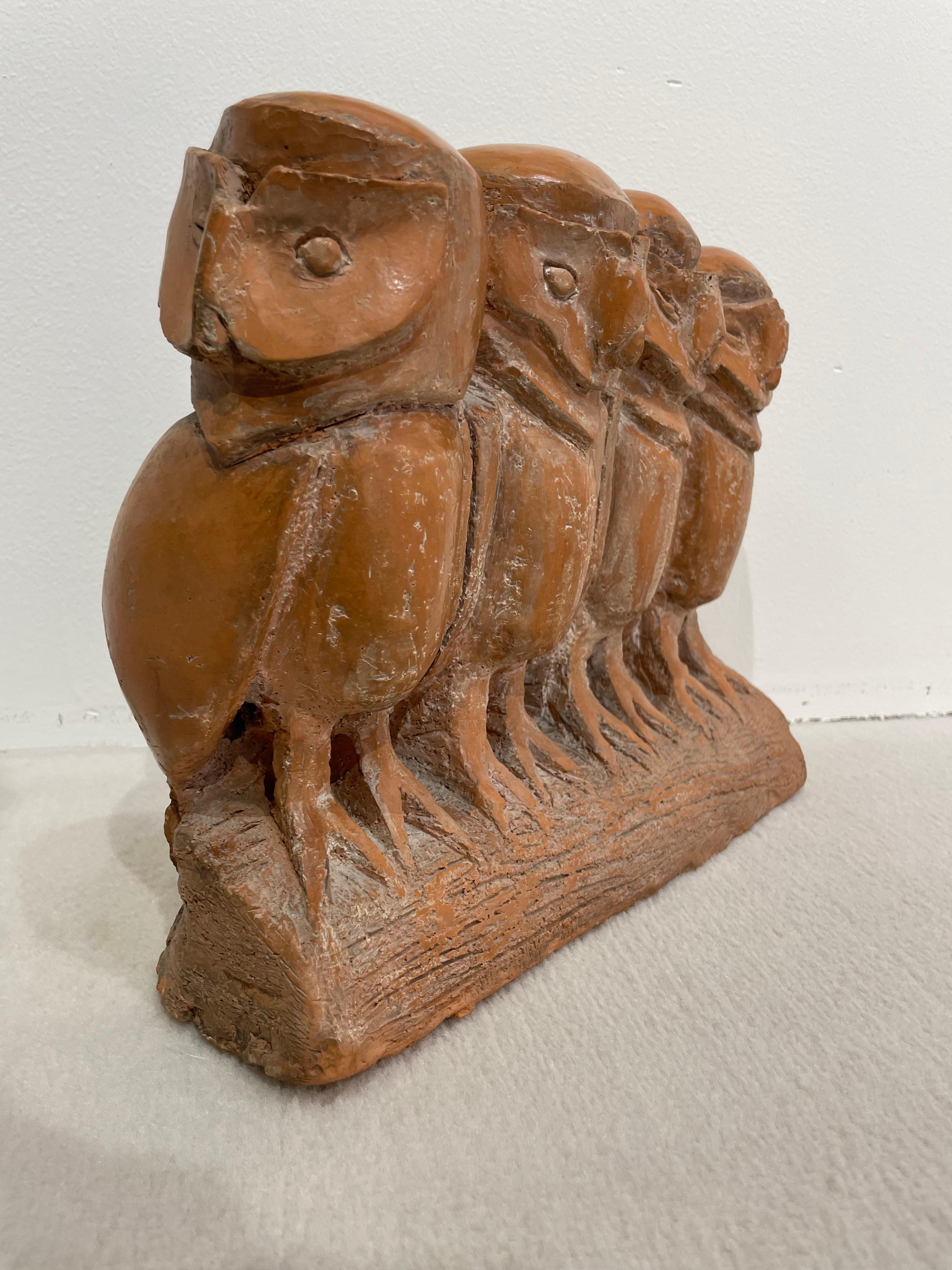 Terracotta sculpture representing four owls aligned on a thick branch and each showing a different expression. The mastery of the artist's work is accomplished
The stylized scope gives this object a unique character and reflects the style of the