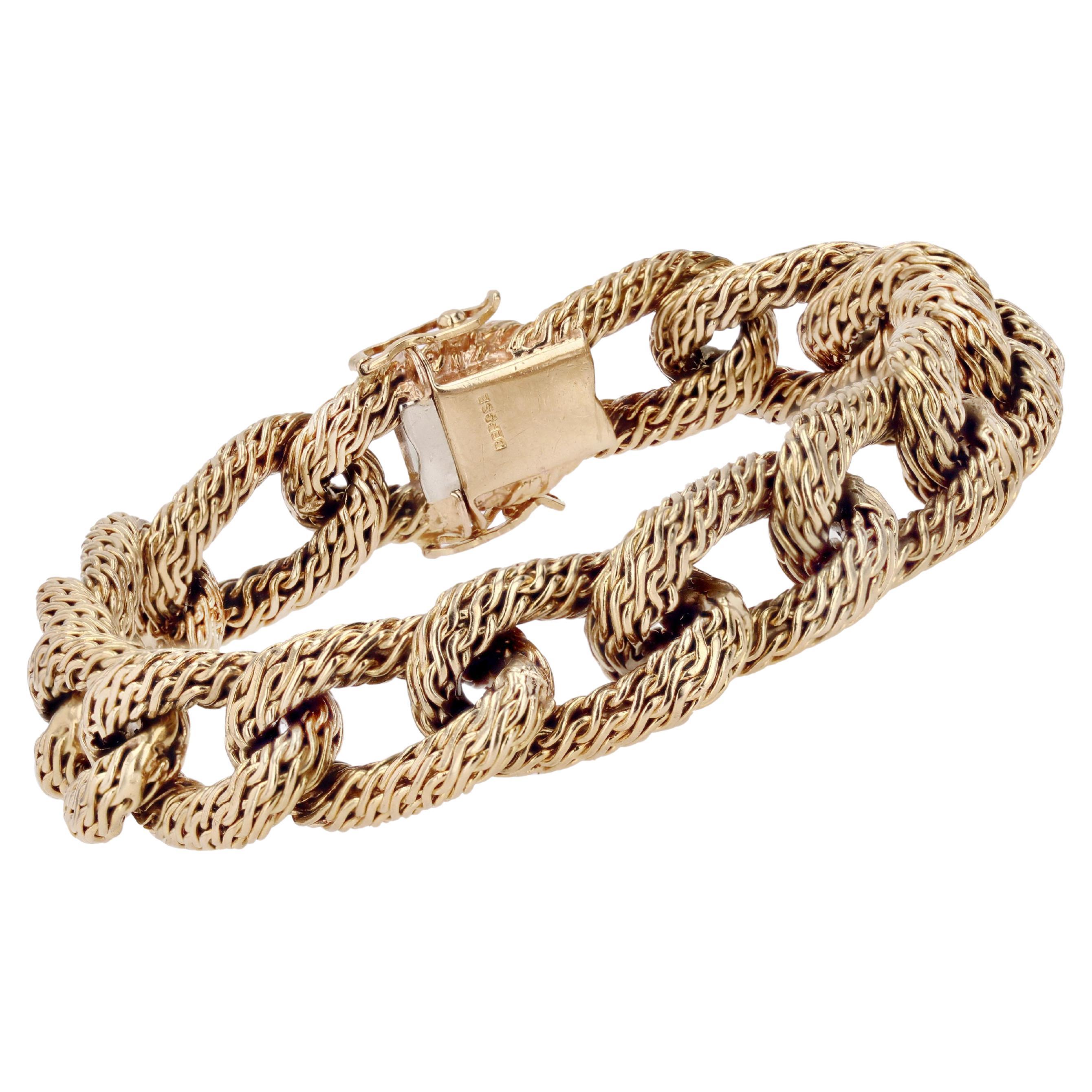 French 1960s Vintage 18 Karat Yellow Gold Chiselled Chain Bracelet For Sale