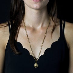 French 1970s 18 Karat Yellow Gold Chain and Masai Pendant