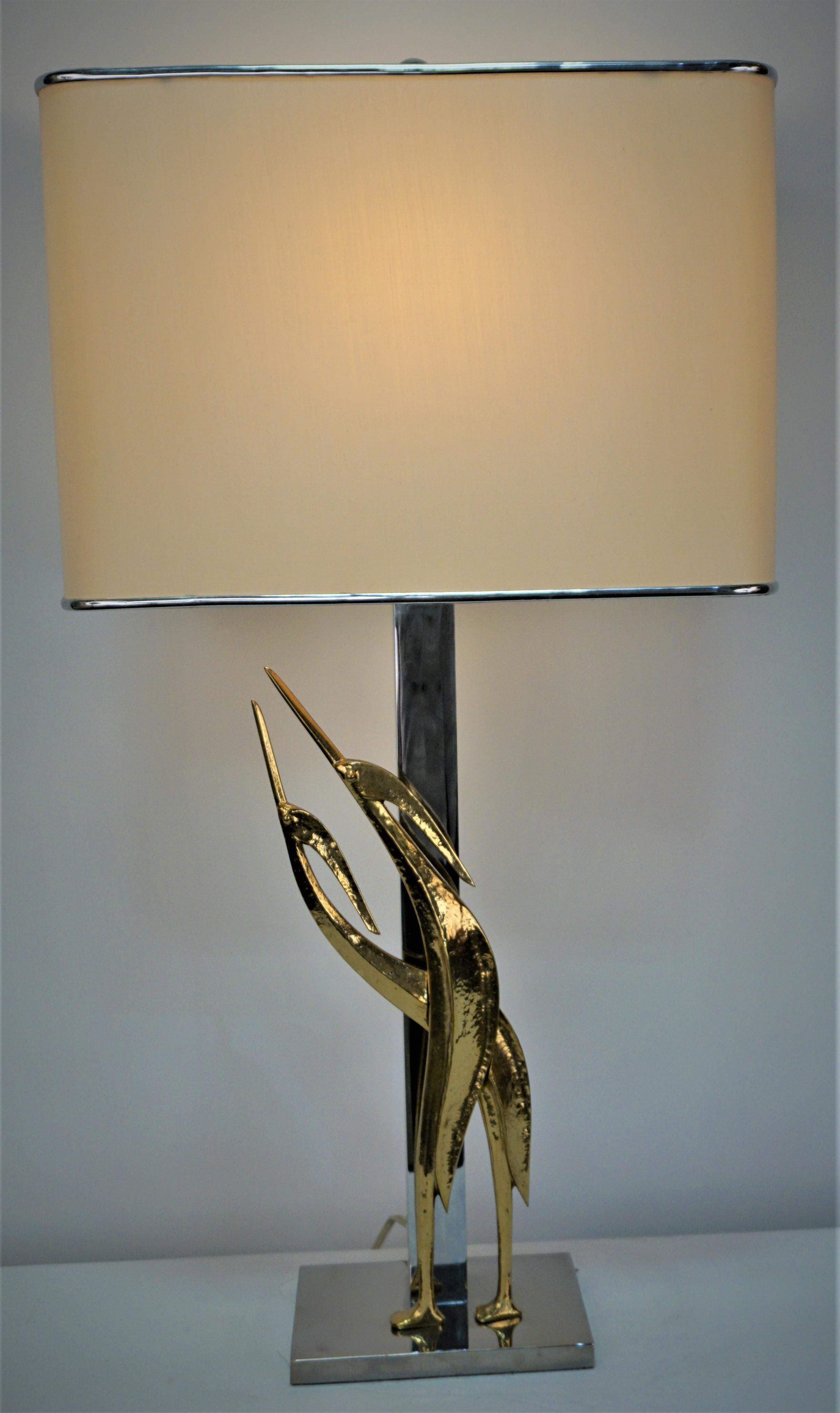 Polished bronze with nickel on bronze base table lamp with custom made silk lampshade.
Measurement include the lampshade.