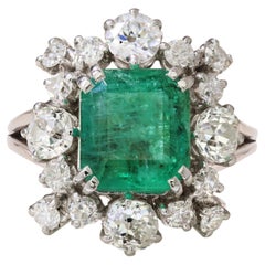 French 1970s Emerald Diamonds 18 Karat White Gold Cluster Ring